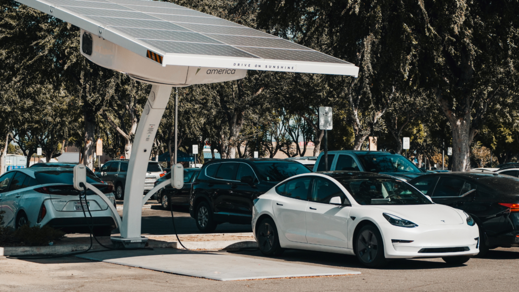 Tesla electric car soaking up energy at a Supercharger point.